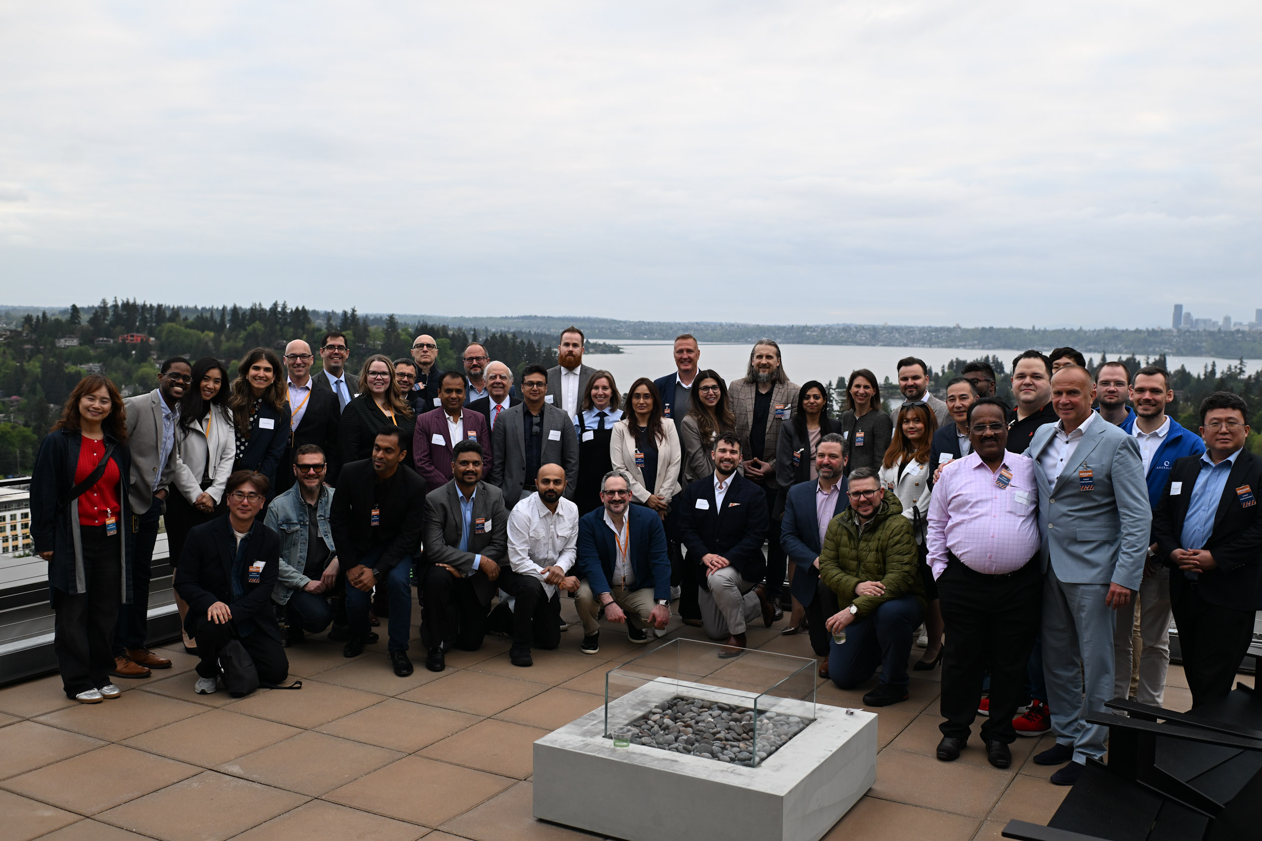 Group of international leaders standing on the rooftop of Amazon Everest for Greater Seattle Partners SelectUSA Seattle Spinoff
