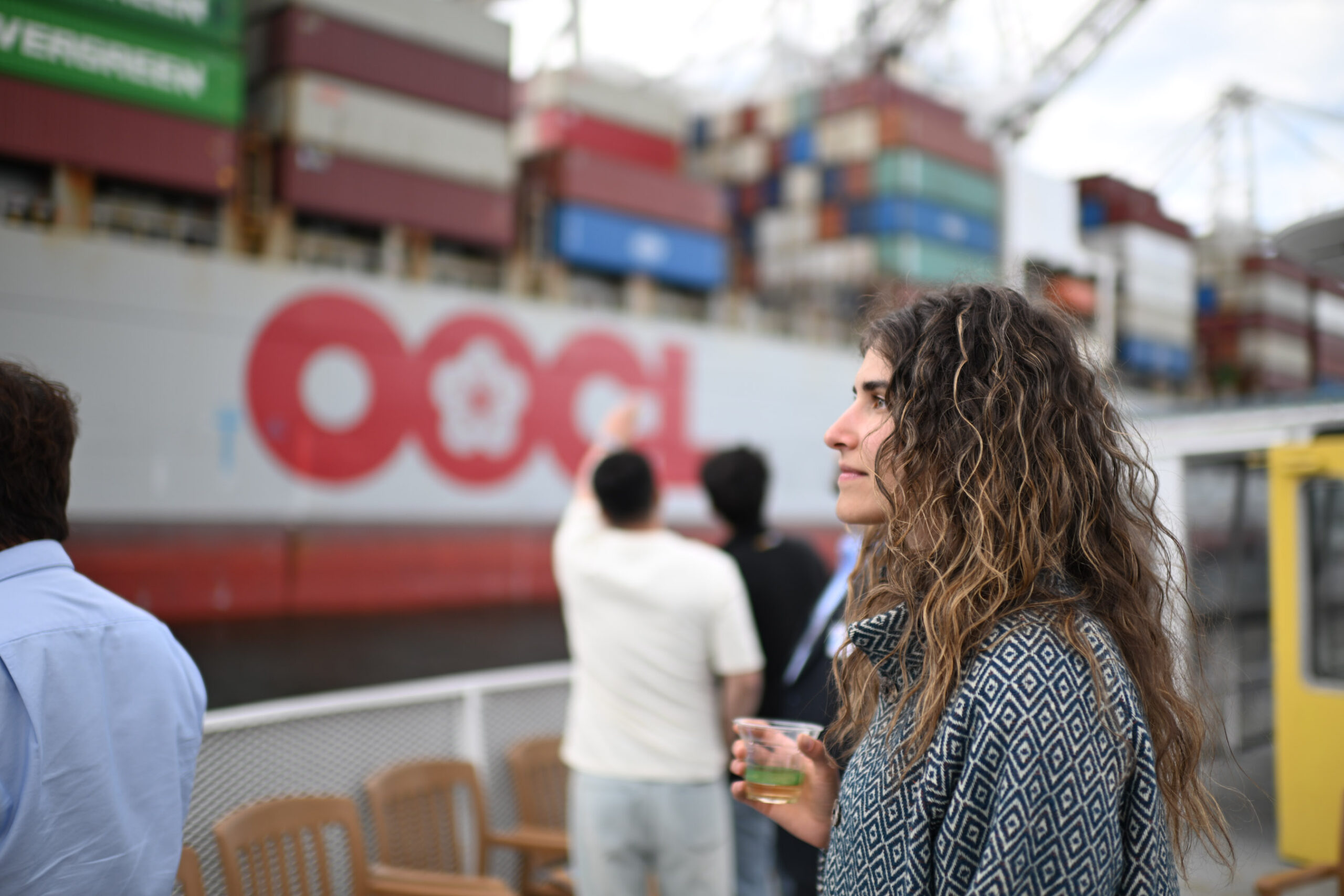 Greater Seattle Partners Research Director Victoria DePalma looking at cargo ship at Port of Seattle